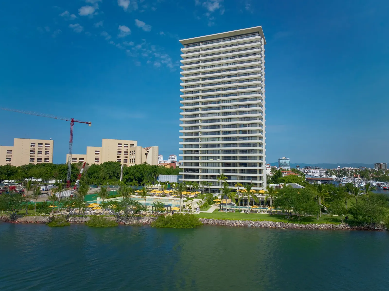 Aerial view of the Marina Towers tower beside the marina and the beach
