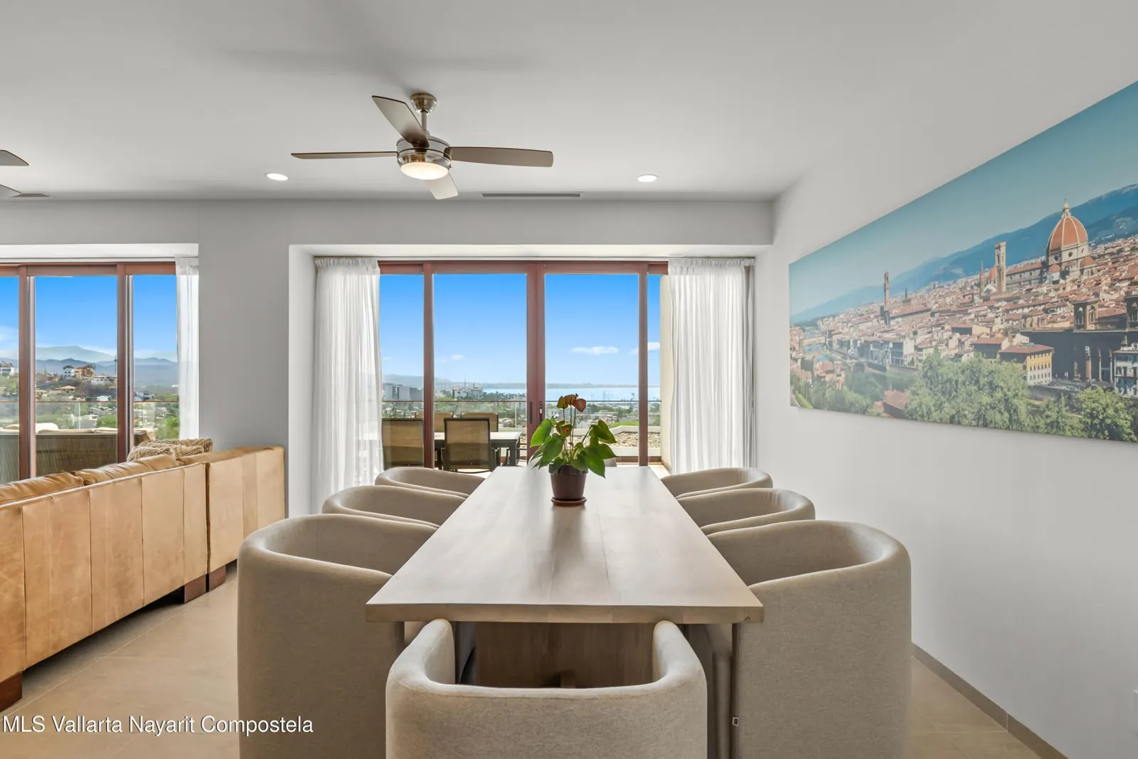 Dining and living area of Alamar Cabo 101, with a sea view