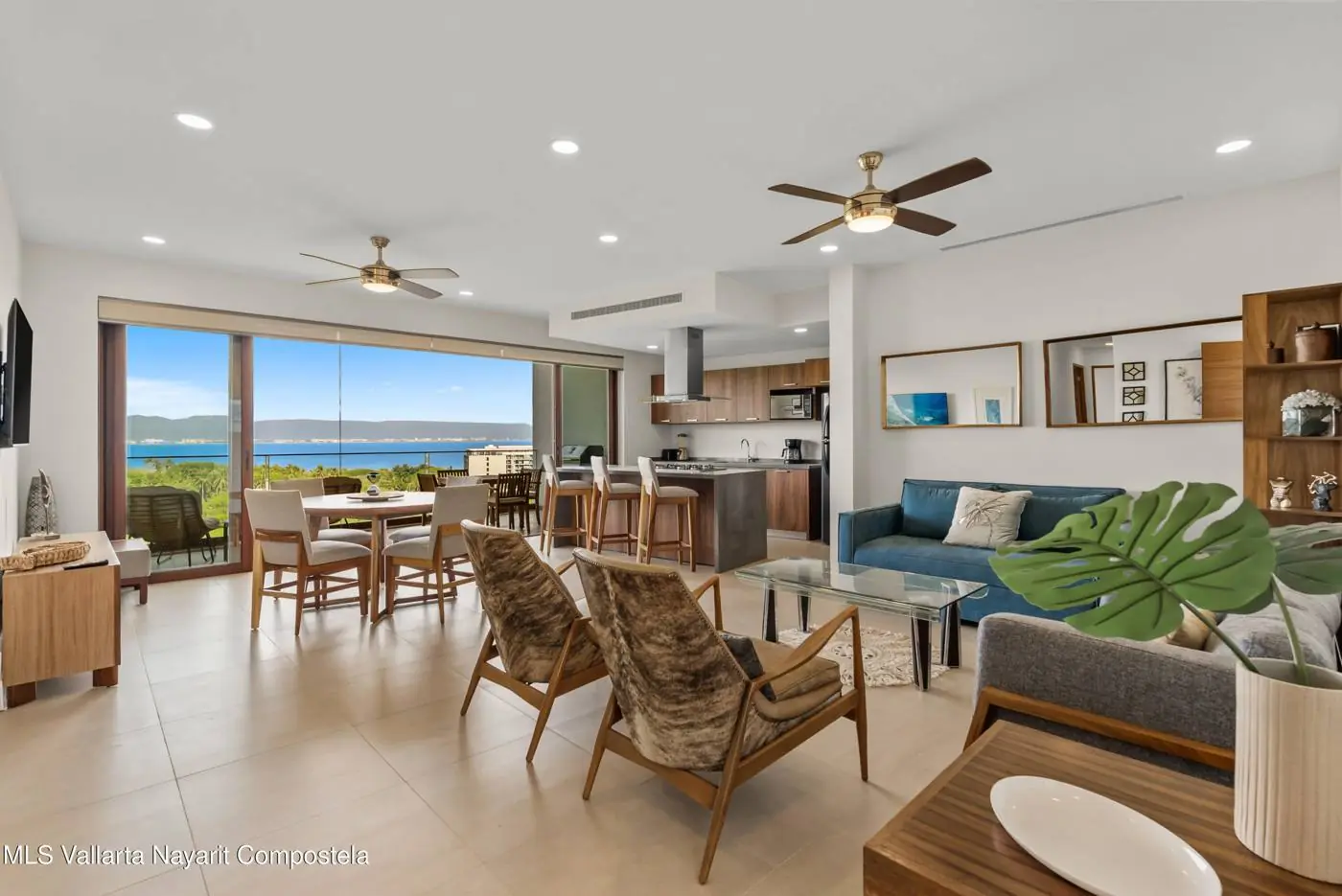 Living and dining room with bay view