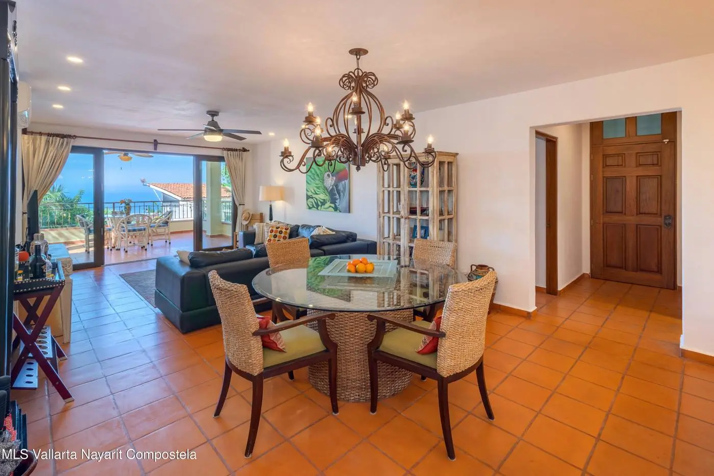 Living and dining room opening to the terrace