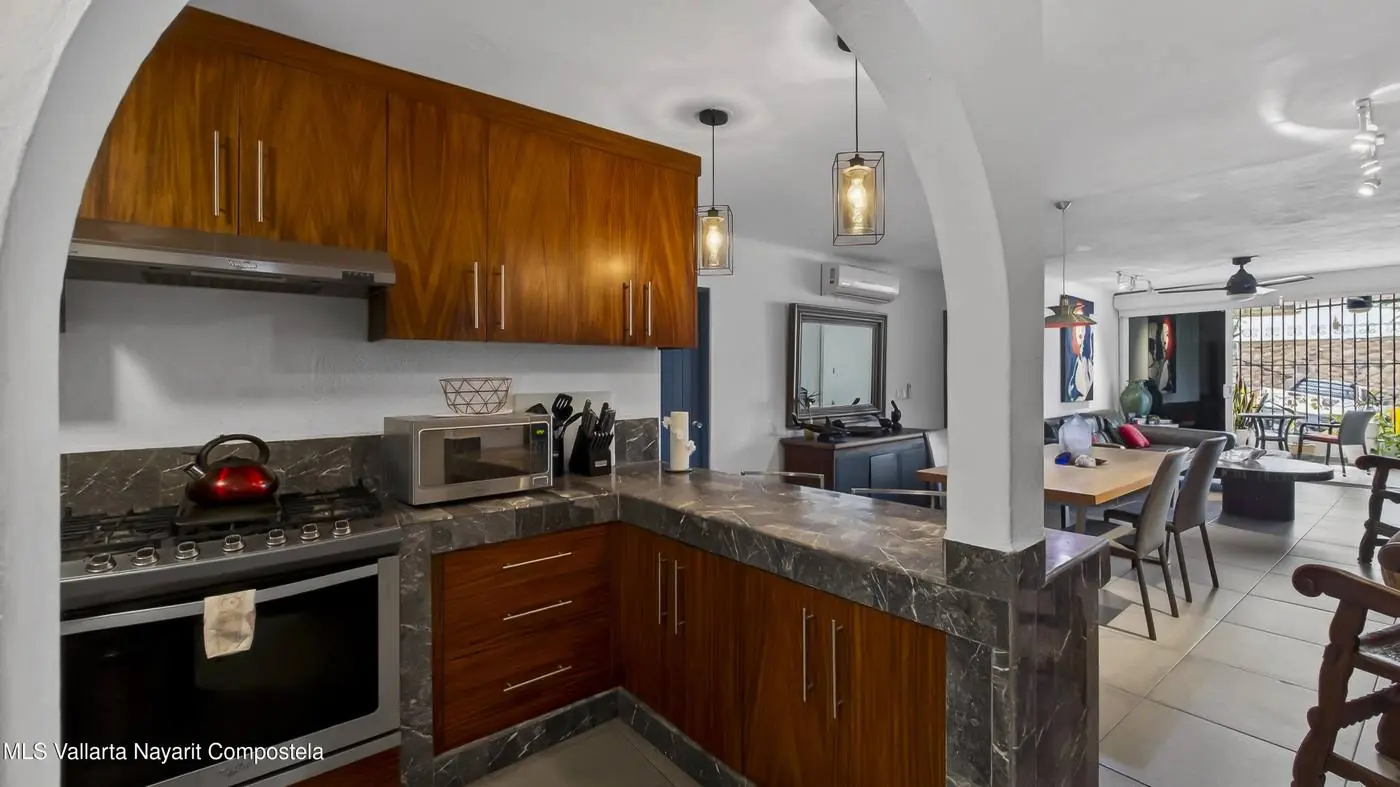 Kitchen and dining area of an apartment at La Palapa, Zona Romántica