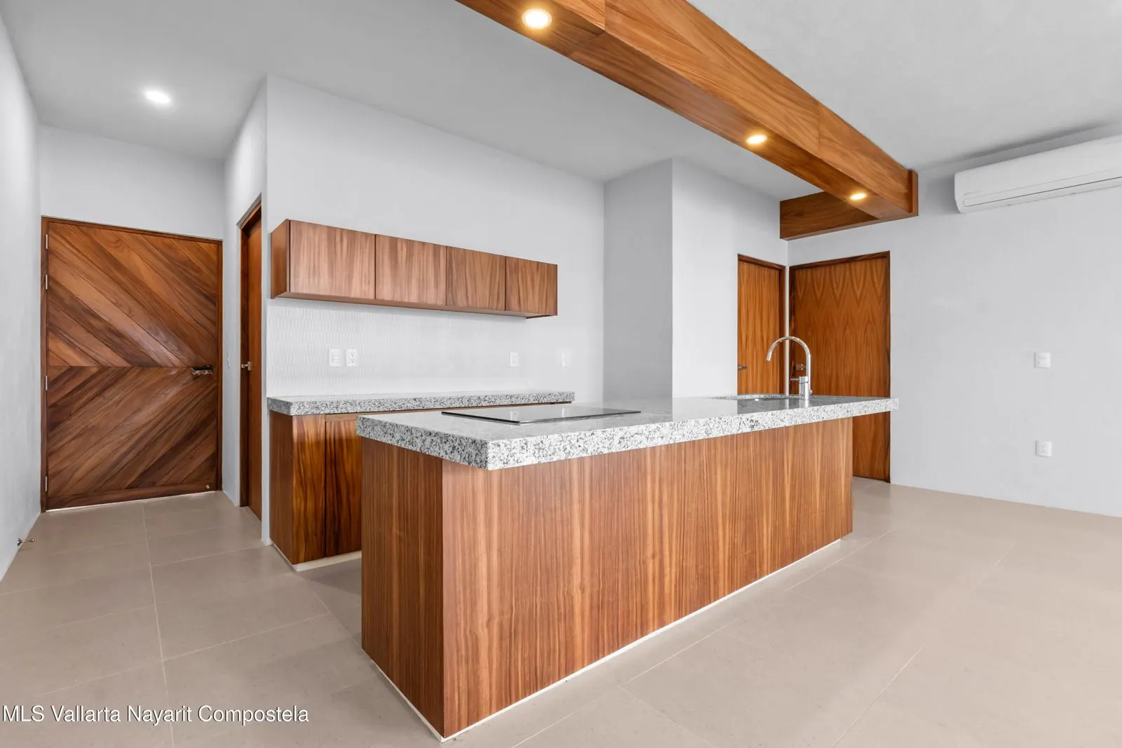 Bedroom of Nexpa Bucerías UP1, with dark wood