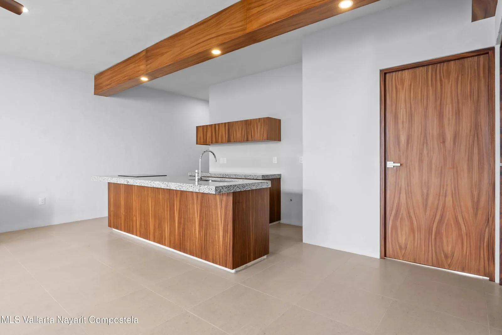 Bedroom of Nexpa Bucerías UP1, with dark wood